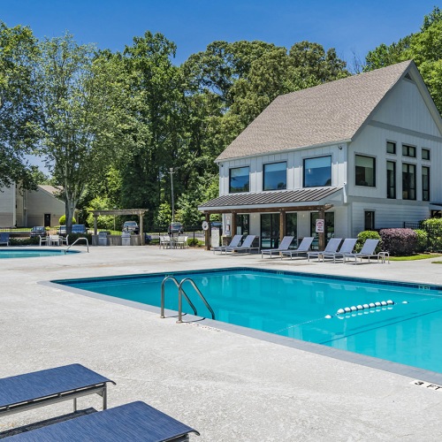Resort-Style Swimming Pool Resort style swimming pool with a large deck at Domain & Gateway at Cedar Apartments in Decatur, GA