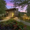 rendering of clubhouse entrance at dusk